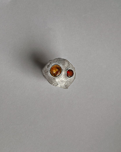 Silver ring with a red garnet and yellow sapphire